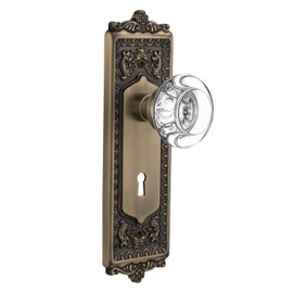 Nostalgic Warehouse 712598 Door Knob Egg & Dart Plate with Keyhole Round Clear Crystal Glass Knob, Mortise-2.25", Antique Brass