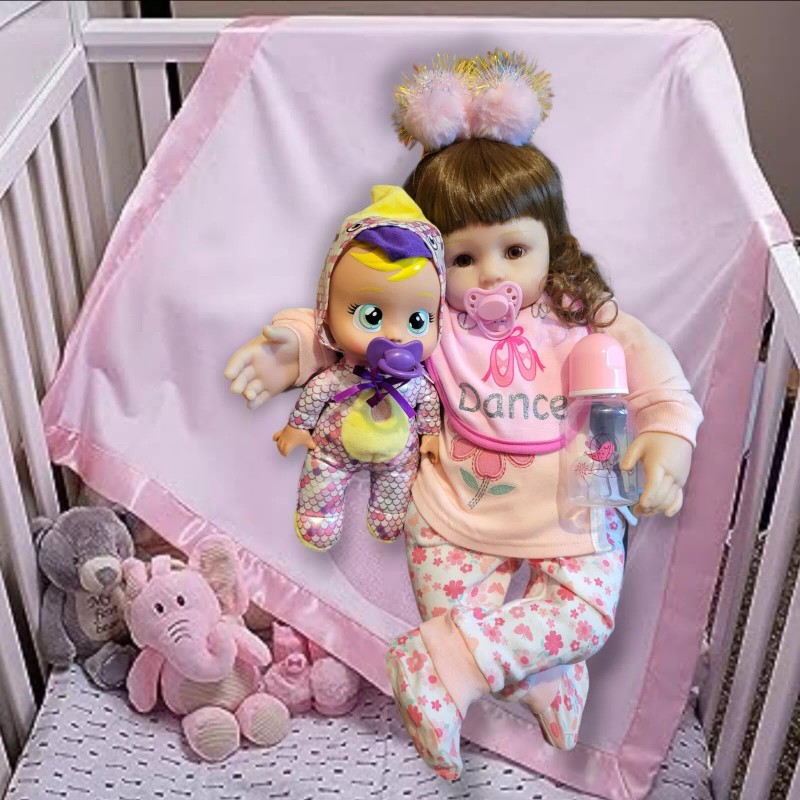 Hesstian 24-inch silicone vinyl doll with more than 10 accessories.