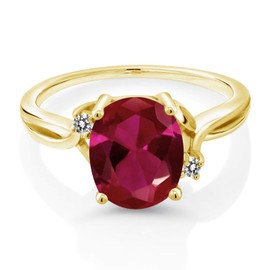Gem Stone King 18K Yellow Gold Plated Silver Red Created Ruby and White Diamond 3 Stone Ring For Women (2.53 Cttw, Oval 10X8MM, Gemstone July Birthstone, Available In Size 5, 6, 7, 8, 9)