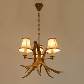 Xuthusman 18" Rustic Antler Chandelier 3 Lights, Farmhouse Chandeliers with Resin 3 Antlers and Retro Metal Wagon Wheel Vintage Style for Dining Room, Kitchen (Antique Color 18 inches in Diameter)