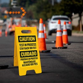 Sigo Signs Caution Test in Process Stay Back 100 Feet Bilingual Sidewalk Sign Kit, 10x16 Inches, with A Frame Stand, Made in USA
