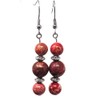 Chic and classic Thurcolas dangling earrings made of red imperial