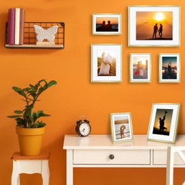 Frametory, Gold Aluminum Picture Frame with Removable Mat - Set of 7 Includes Four 5x7, Two 8x10, One 11x14 - Real Glass Front - Simple Gallery Wall Frames for Art Prints and Posters