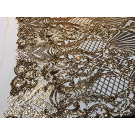 NEW CREATIONS FABRIC ANDFOAM INC GOLD SHINY SEQUIN DAMASK DESIGN EMBROIDERY ON A 4 WAY STRETCH MESH-1 YARD.