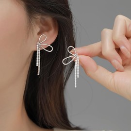 SLUYNZ Sterling Silver CZ Bow Dangle Earrings for Women Rhinestone Bow Drop Earrings Tassel, Sterling Silver