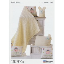 Double Knitting Pattern - Baby Blanket, Cushion & Hat in Cream (UKHKA 140)