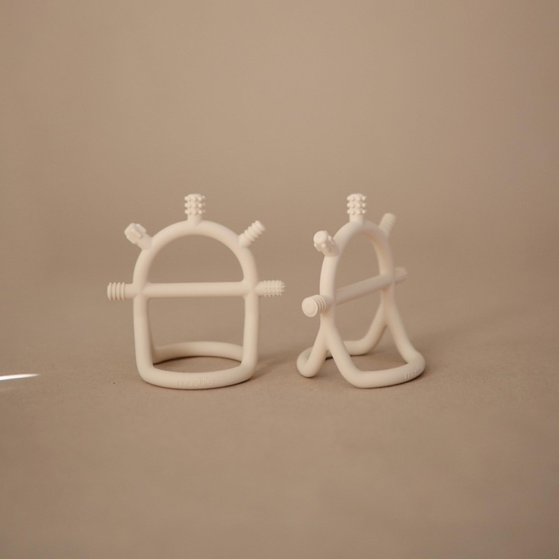 mushie Silicone Baby No-Drop Sensory Teether Toy