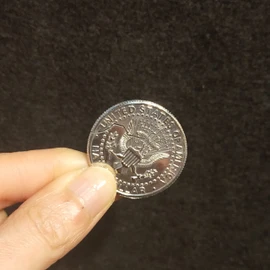 Magic of Nibbling Coins (Just bite a coin and blow it into a breath, and instantly restore it!>