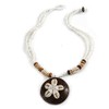 Avalaya Brown/Cream Coconut Shell Round Pendant with White Glass Bead