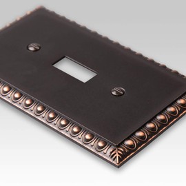 Amerelle Egg & Dart Single Toggle/Single Rocker Cast Metal Wallplate in Aged Bronze