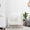 DaVinci Jenny Lind 3-in-1 Convertible Mini Crib in White, Removable
