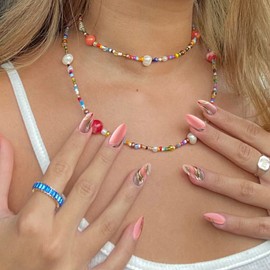 YOSOMK Press on Nails Medium Almond Fake Nails with Swirl Designs Glossy Stick on Artificial Nails Glitter Sequins Full Cover Pink False Nails for Women