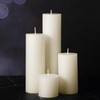 Shihanee Set of 8 Ivory Pillar Candles and Glass Cylinder
