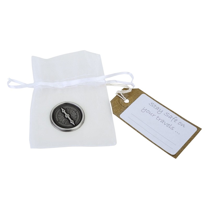 Compass travel token with 'Stay safe on your travels' message