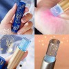 Universo en Linea 2 Pzs Labial 24k Cambia Color Con