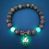 Pulsera luminosa con forma de flor de loto que brilla