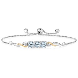 Gem Stone King 925 Sterling Silver and 10K Yellow Gold Sky Blue Topaz and White Lab Grown Diamond Tennis Bracelet For Women (2.12 Cttw, Gemstone November Birthstone, Fully Adjustable Up to 9 Inch)