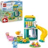 LEGO Bluey Playground Fun with Bluey and Chloe - Toy for 4+ Year Old Girls & Boys - incl. 2 Minifigures, a Functional Pink See-Saw, Slide, Climbing Frame & 3 Plants - Gift for TV Show Fans - 11201