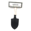 "Welcome to Ken's garden" hanging shovel sign