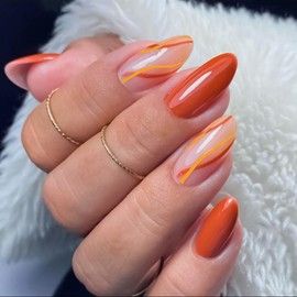 Almond Press on Nails Medium Length Fake Nails Dark Orange False Nails with Yellow Orange Lines Waves Designs Glossy Glue on Nails Reusable Stick on Nails for Women Girls Daily Manicure Decorations