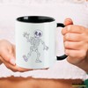 Huuraa Kaffeetasse winkendes Skelett Comic Geschenk 330ml Schwarz winkendes Skelett