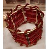 Set mit 4 roten Serviettenringen aus Metall und Perlen