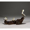Brown Pelican Trio by John Perry Sculpture on burlwood base