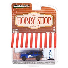 Greenlight Collectible 2001 Cherokee Sport Off-Road Blue and Black and Race Car Driver Figurine The Hobby Shop Series 12 1/64 Diecast Model Car by Greenlight 97120 E