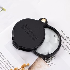 GDQLCNXB 1Pcs 10X Mini Pocket Magnifier, Glass Folding Magnifying with Rotating Protective Leather Sheath for Reading, Science, Jewelry, Books, Lens Size 2.4"(Black)