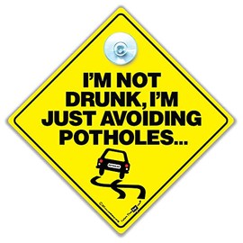 I Am Not Drunk I Am Just Avoiding Potholes Car Sign, Suction Cup Car Sign, Baby On Board Sign Style Joke Car Sign For Slow Drivers in Super Bright Yellow and Black 14cm x 14cm