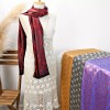 AeraVida Elegantly Stunning Hand Woven Red and Black Silk Elephant