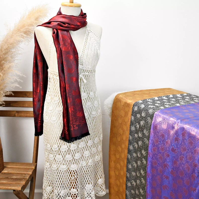AeraVida Elegantly Stunning Hand Woven Red and Black Silk Elephant