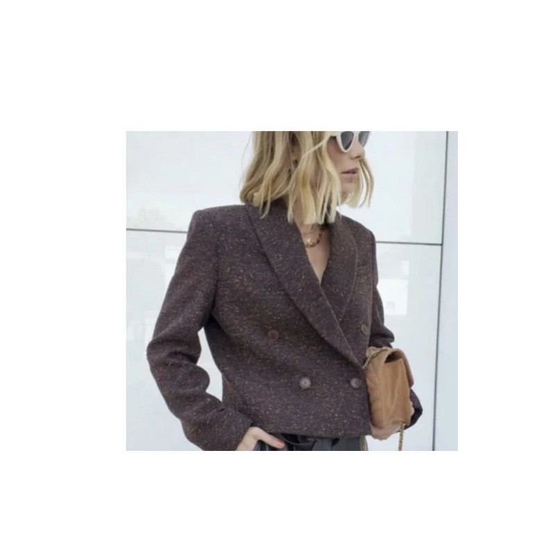 Anine Bing features double breasted closure with a cropped, boxy