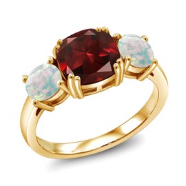 Gem Stone King 18K Yellow Gold Plated Silver Red Garnet and Simulated White Opal 3 Stone Engagement Ring For Women (3.50 Cttw, Gemstone January Birthstone, Cushion 8MM, Size 6)