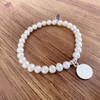Agálea | Pulsera de Perlas naturales con dije de San