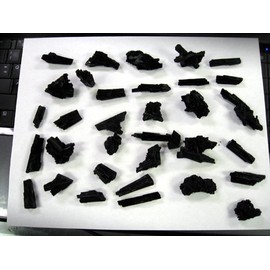 NATURAL BLACK TOURMALINE CRYSTALS.ROUGH, UNPOLISHED, NATURAL. 35 PIECES TOTAL. WEIGHT FULL 1/2 POUND.