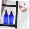 FOMIYES 2pcs Refillable Liquid Pump Bottles for Essential Oils Shampoo