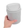 ULTECHNOVO Small Trash Can with Rotating Lid: Tiny Wastebasket for