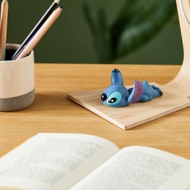 Enesco Showcase Collection Stitch Laying Down Figurine