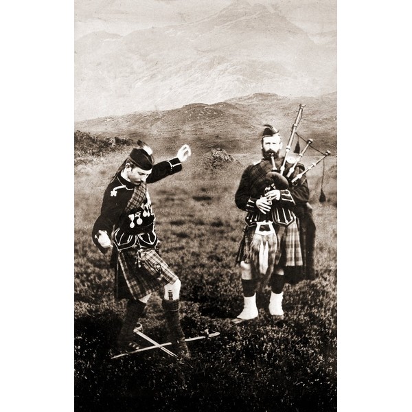 Two Men in Kilts Dance Over Swords with Bagpipe Playing