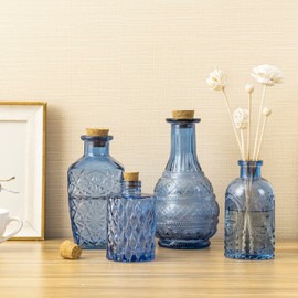 MyGift Small Blue Glass Reed Diffuser Bottles - Vintage Embossed Apothecary Style Flower Bud Vases with Cork Lids - Assorted Designs & Sizes, Set of 4