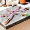 Romantic Rain Brillo Lip Gloss Doble Con Labial Mágico Cambia