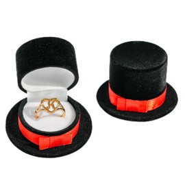 gold K-letter ring paired with black dress hat gift box