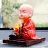 EatingBiting Little Monk Figurine Solar Buddha Monk Shaking Head Statue