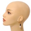 Stylish Black/White Glass Bead Drop Earrings With Gold Tone Bean