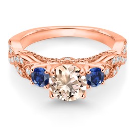Gem Stone King 18K Rose Gold Plated Silver Peach Morganite Blue Created Sapphire and White Moissanite Engagement Ring For Women (1.15 Cttw, Gemstone October Birthstone, Round 6MM and 3MM) (Size 9)