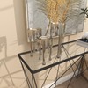 CosmoLiving by Cosmopolitan Aluminum Metal Abstract Decorative Candle Holder Melting