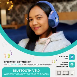 Squishmallows Ingred The Cow Plush Bluetooth Headphones With Built-in Microphone To Make And Receive Calls. 10 Meter Bluetooth Range, Volume Control, Soft Plush Ear Cushions With Adjustable Headband.