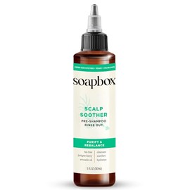 Soapbox- CALMA EL CUERO CABELLUDO SECO CON PICOR con las propiedades purificantes del aceite de árbol de té, la manteca de karité, las vitaminas B5, A