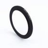 77 mm - 82 mm step up filter adapter ring.
